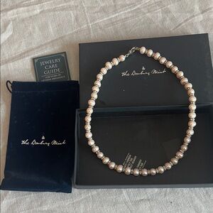 Danbury Mint pink pearls individually knotted with crystals in between. Gorgeous